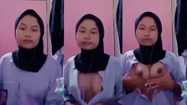 Bokep Jilbab VCS Bocil Sange Remas Toket Sendiri poster